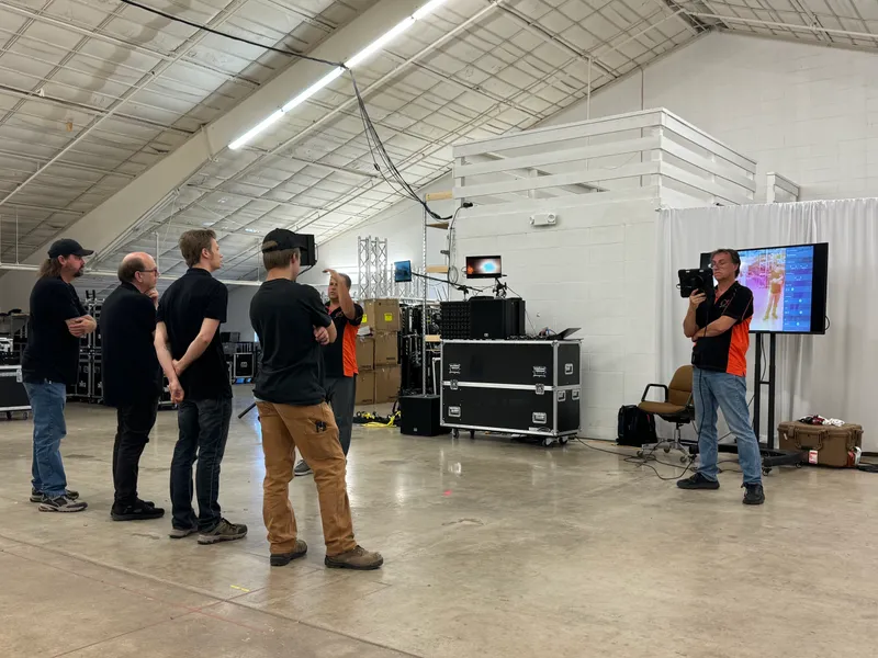 Academy attendees with EDC loudspeakers